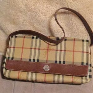 Authentic Burberry Haycheck leather wristlet.